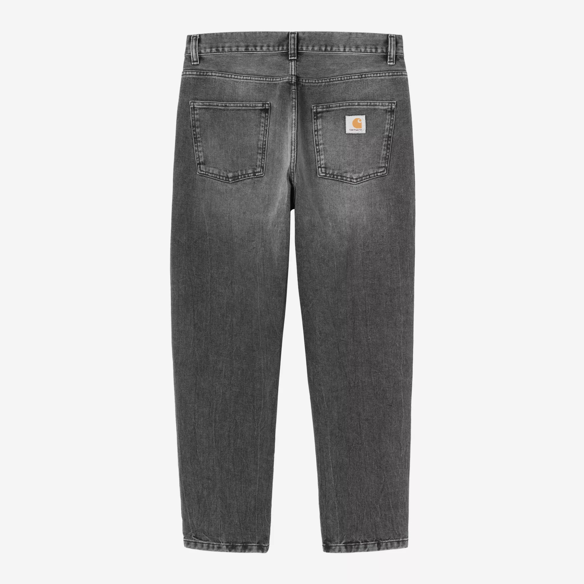 Jean Newel Carhartt WIP Black Marble Used Wash à plat de dos : empiècement et étiquette carrée sur la poche droite