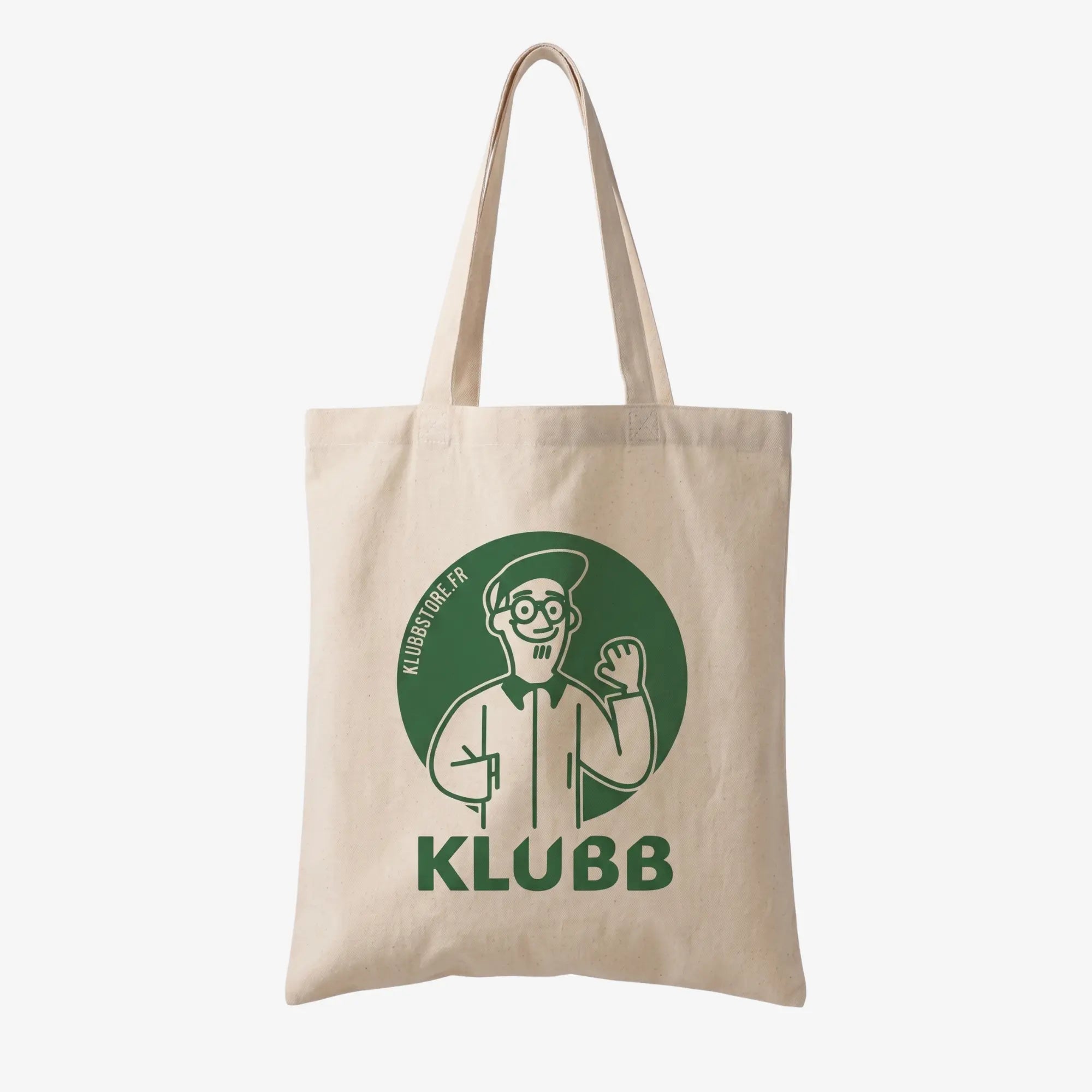 Tote bag Klubb en toile écrue : Claude, le bonhomme à casquette, en réserve dans un médaillon vert et KLUBB en capitales dessous