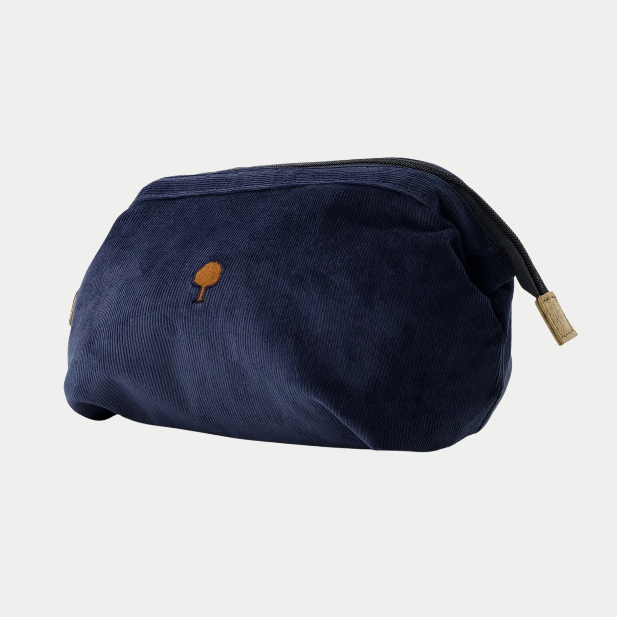 Trousse de toilette Faguo velours côtelé bleu marine de trois quarts, tirette zippée à embout beige naturel