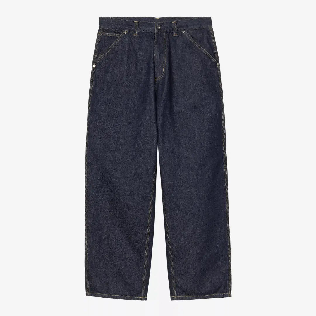 Belmont Pant Blue Rinsed vu de face : denim brut indigo foncé, surpiqûres dorées, rivets, coupe très large