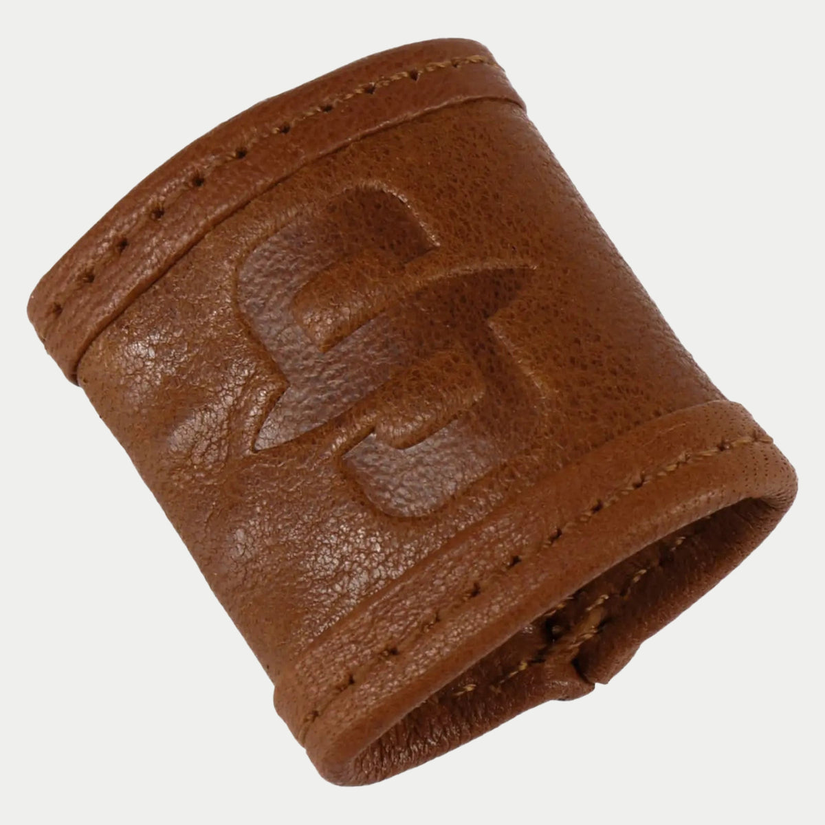 Détail du passant en cuir cognac Stetson avec logo embossé