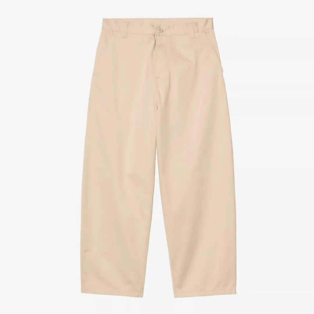 Brady Pant Wall Carhartt WIP vu de face : toile beige sable, poches italiennes, passants, coupe ample fuselée