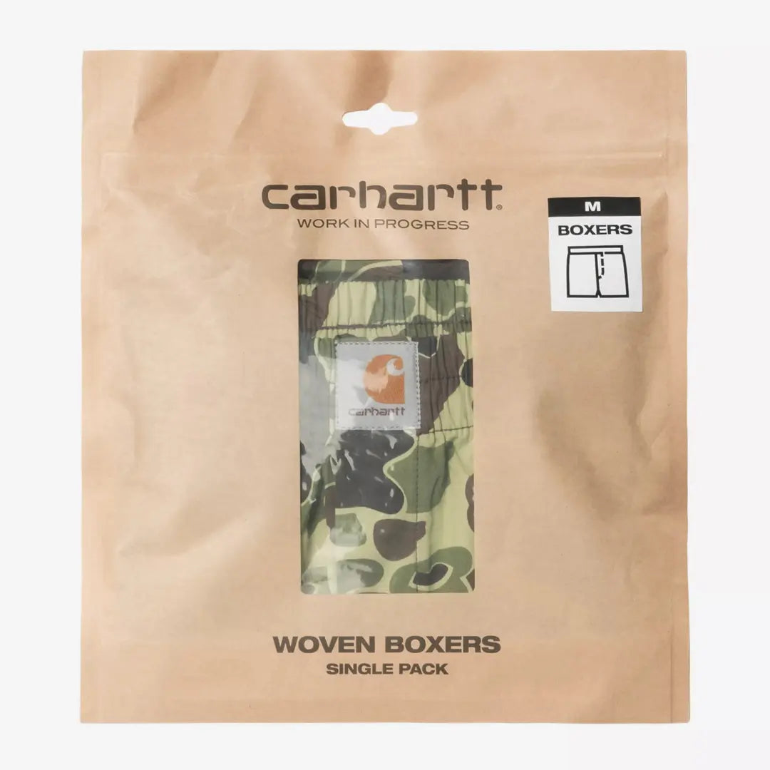 Pochette kraft d'emballage à fenêtre transparente montrant le caleçon camouflage beige, vert et brun