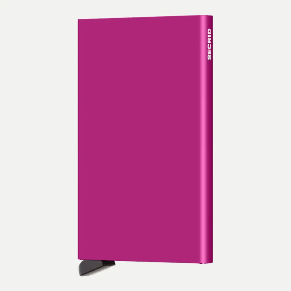 Porte-cartes aluminium rose fuchsia vif de face, petit levier noir sous le boîtier