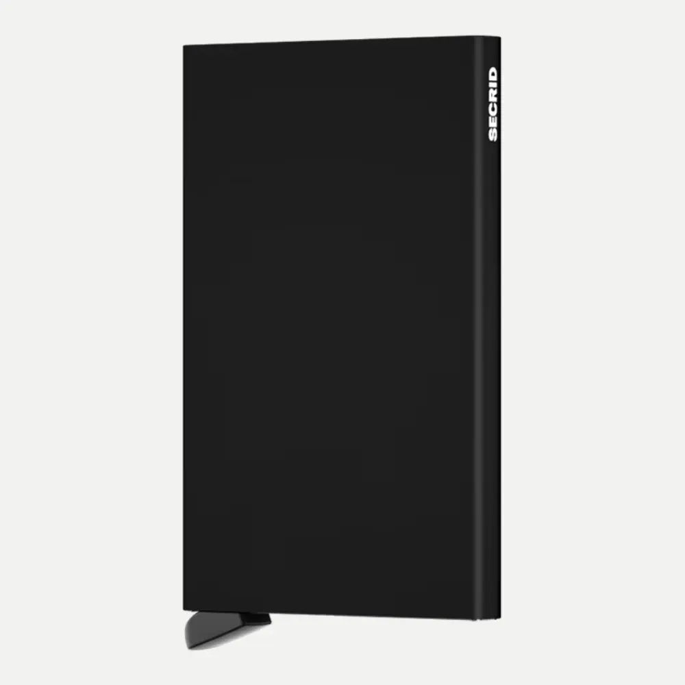 Porte-cartes aluminium noir mat debout de face, logo SECRID blanc sur la tranche