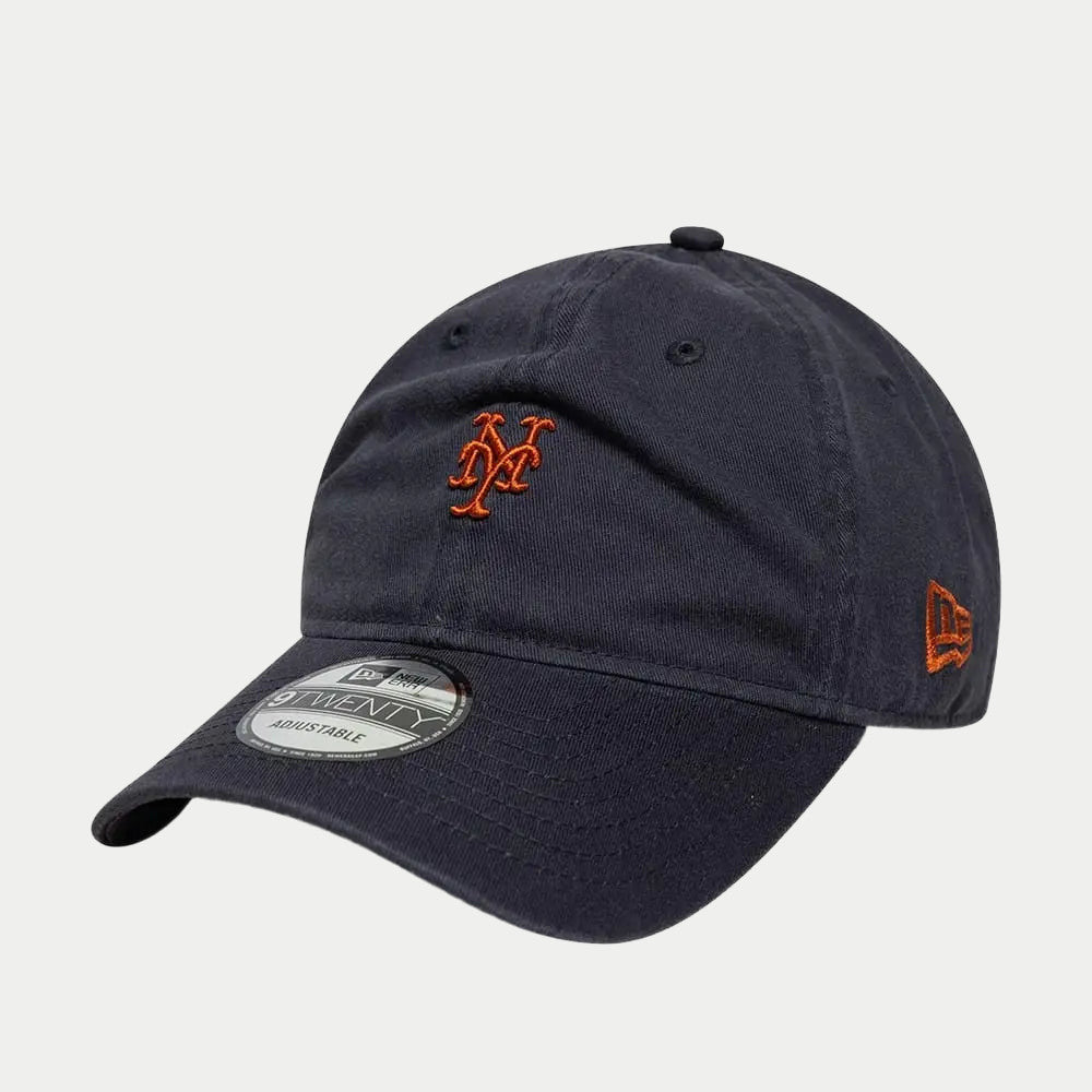 Casquette 9Twenty washed bleu marine de trois-quarts, mini logo NY des New York Mets brodé orange devant