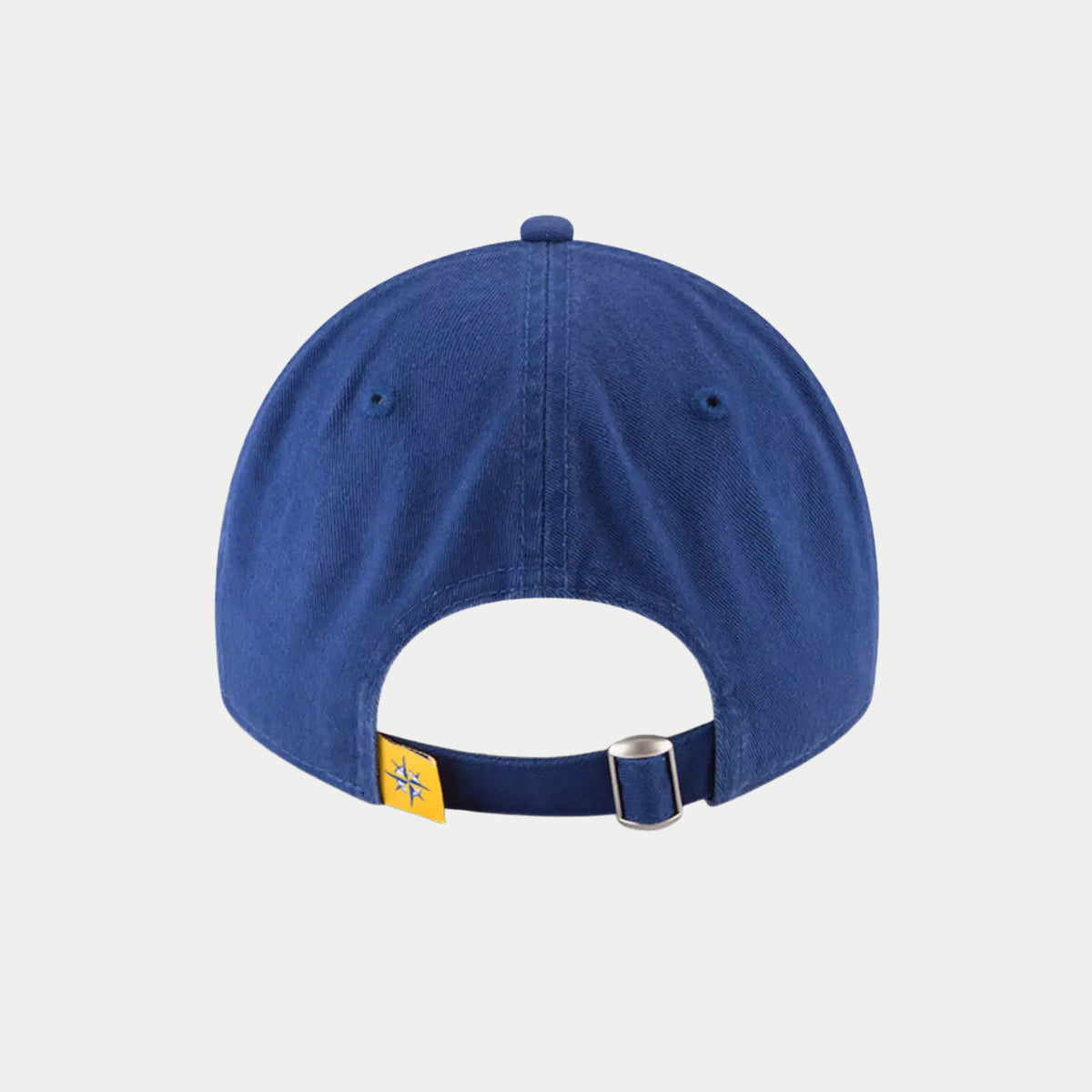 Dos bleu roi : sangle à boucle métal et étiquette jaune à l'étoile compas