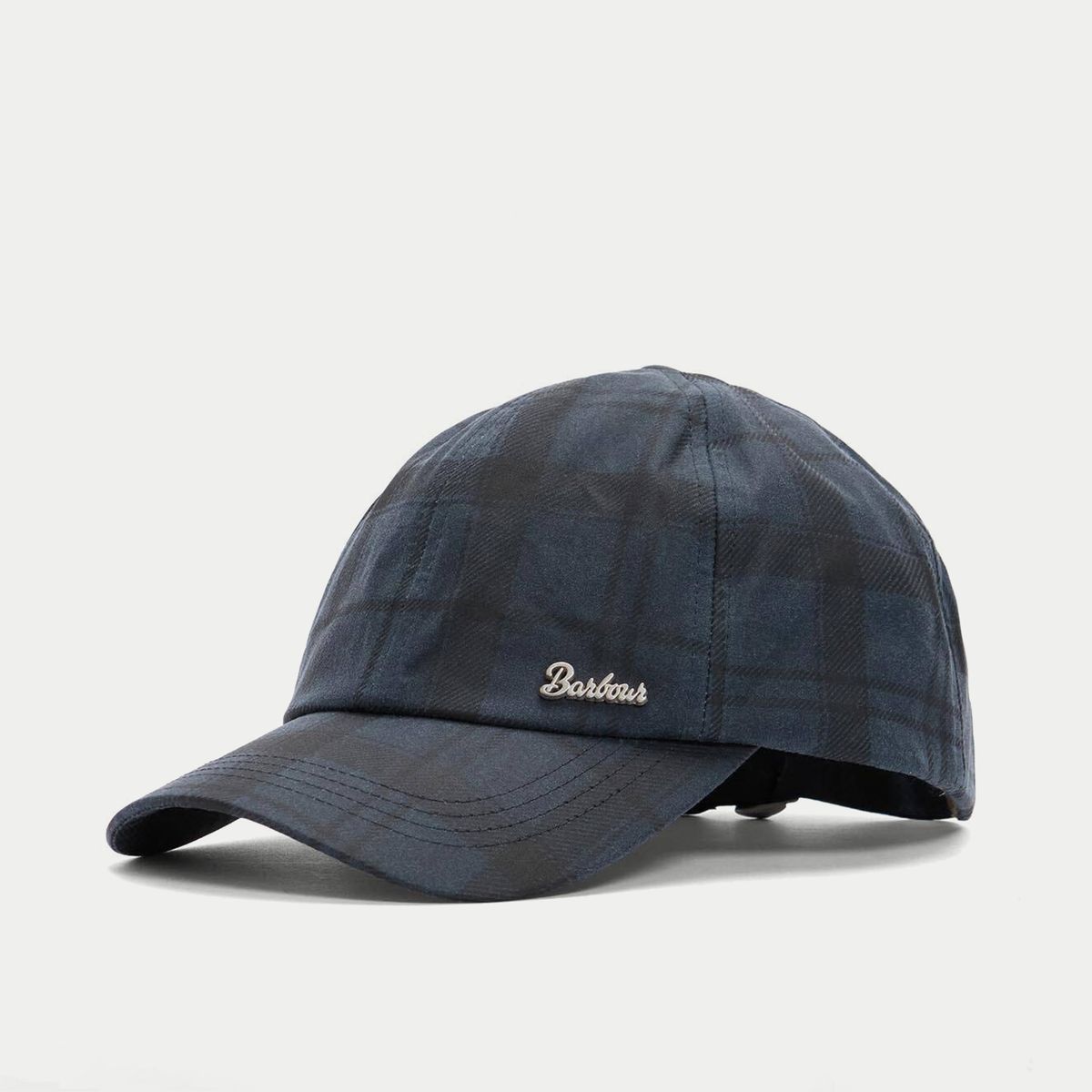 Casquette baseball Ambleside Barbour en coton ciré tartan bleu marine et noir, vue trois-quarts avant gauche