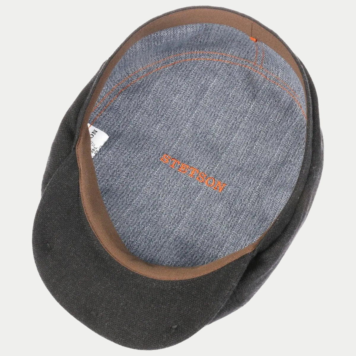 Intérieur de la Brooklin anthracite : doublure à chevrons gris bleuté et biais camel