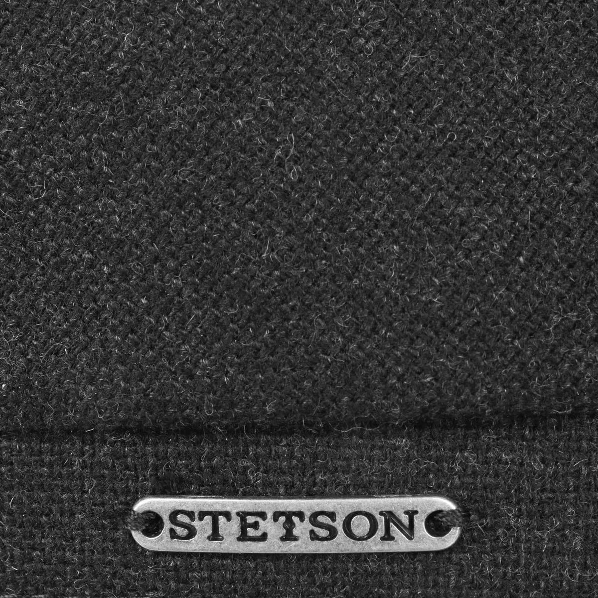 Plaque métallique Stetson posée sur le bandeau arrière en lainage anthracite