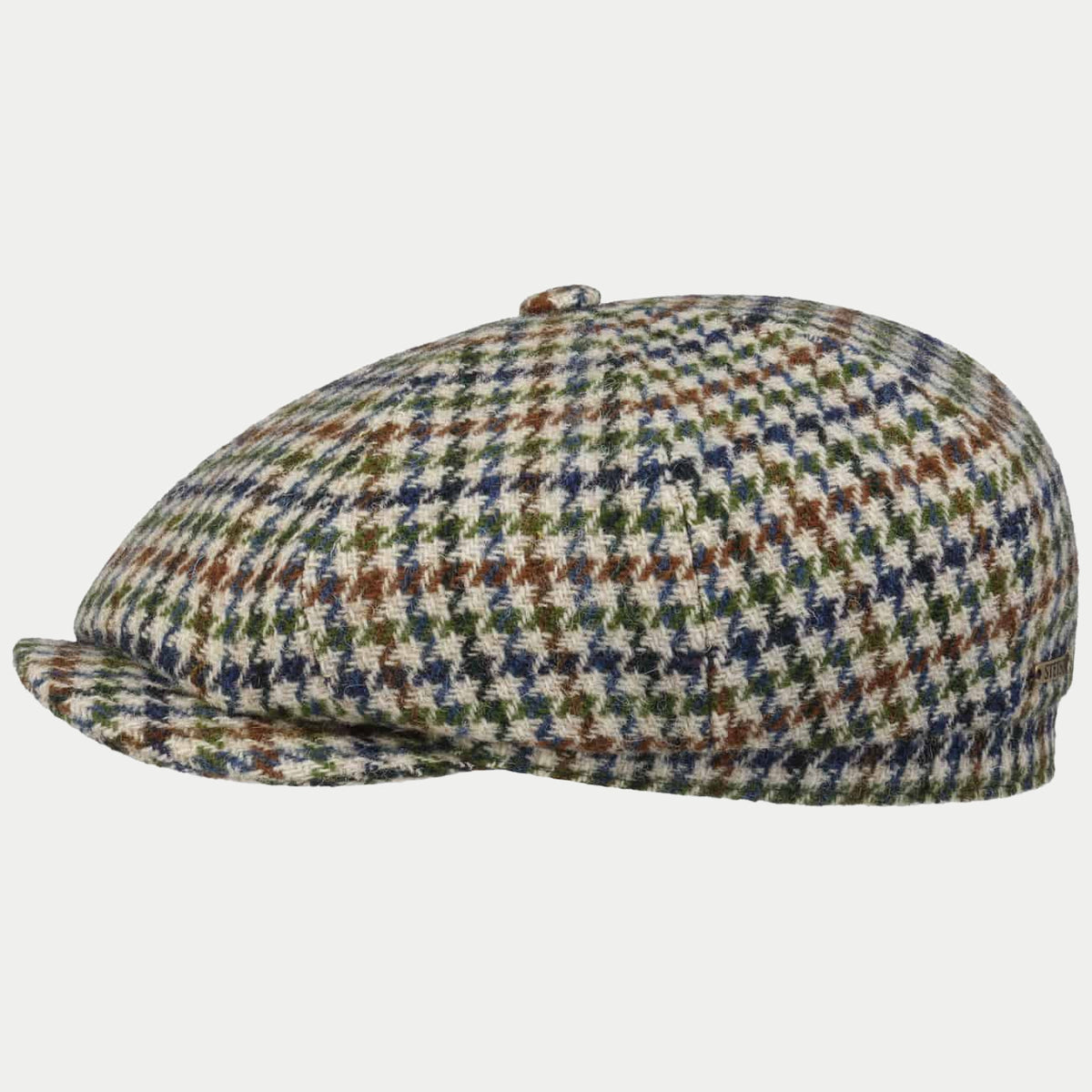 Casquette Hatteras de profil, Harris Tweed pied-de-poule écru, vert, bleu et rouille