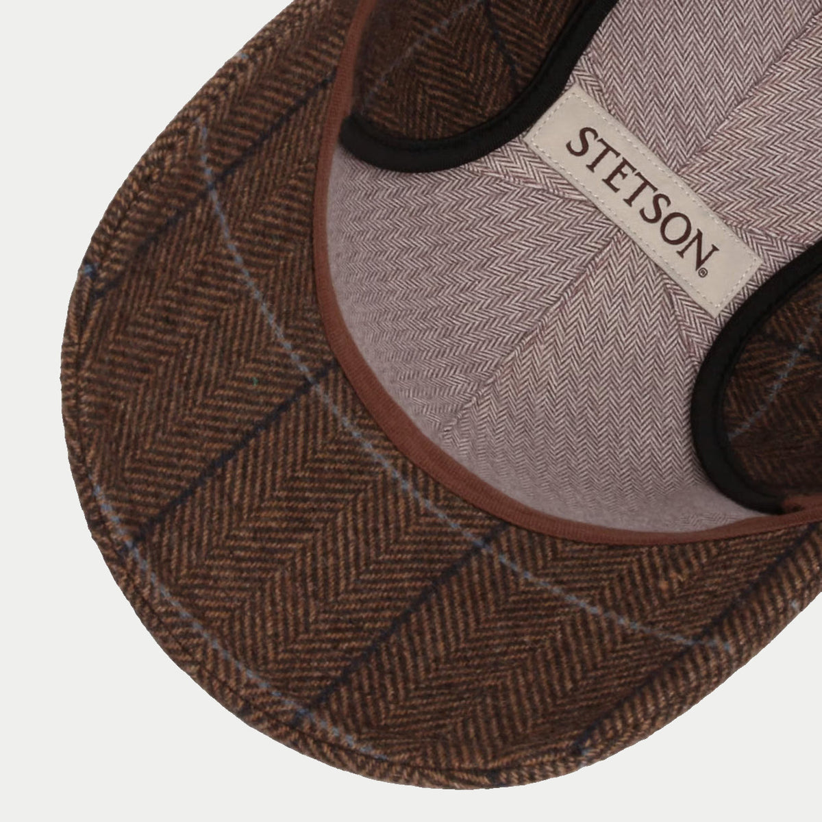 Intérieur de la casquette Kinty marron : doublure coton à chevrons et étiquette Stetson