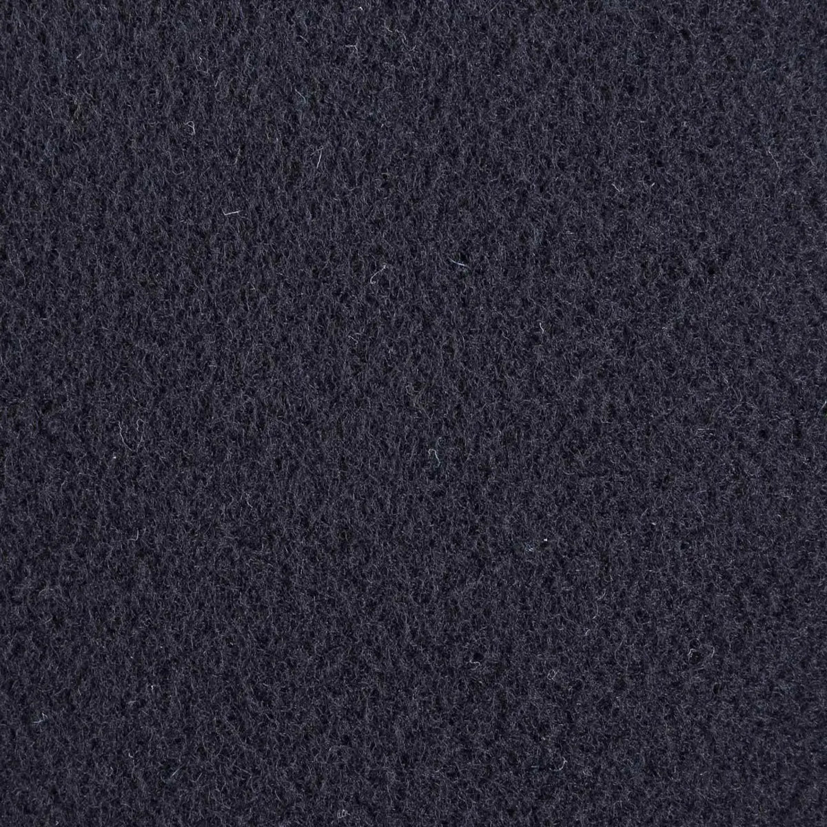 Macro de la laine feutrée bleu marine, aspect drap épais