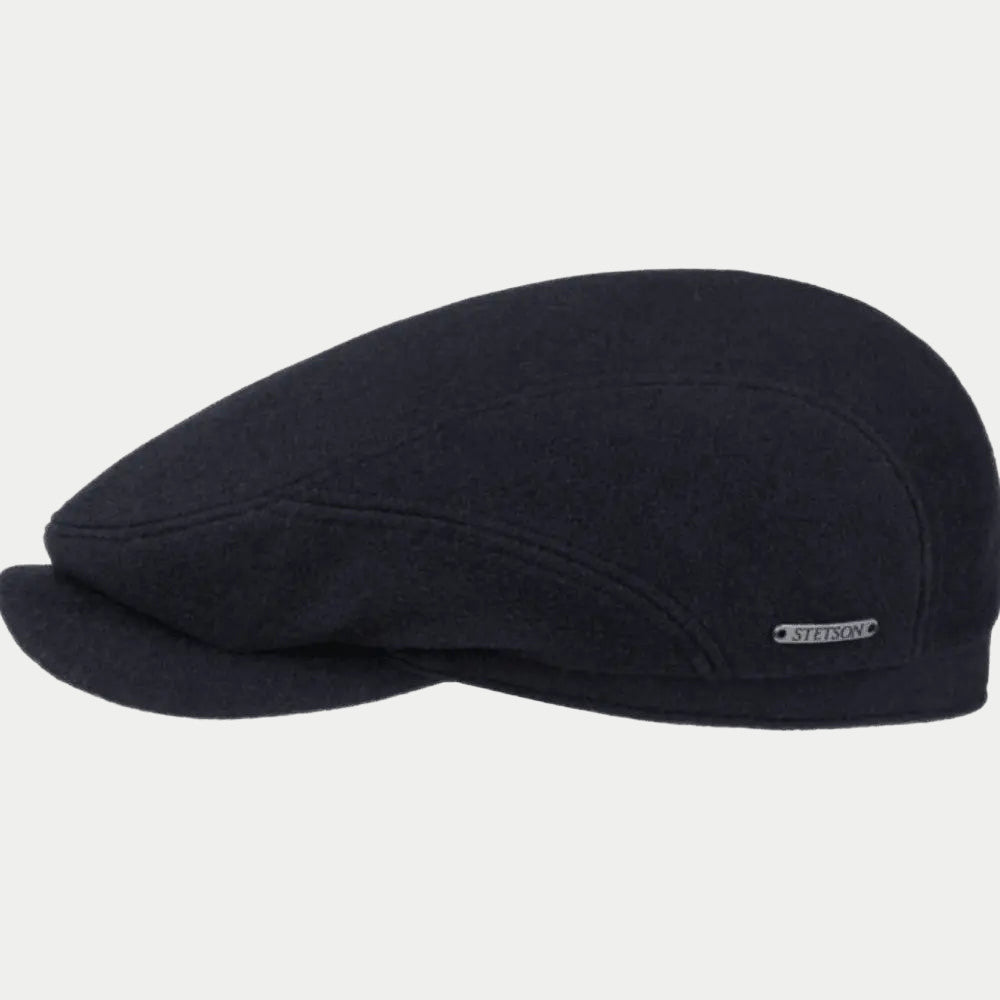 Casquette Driver de profil, lainage bleu marine, calotte d'un seul tenant et visière souple