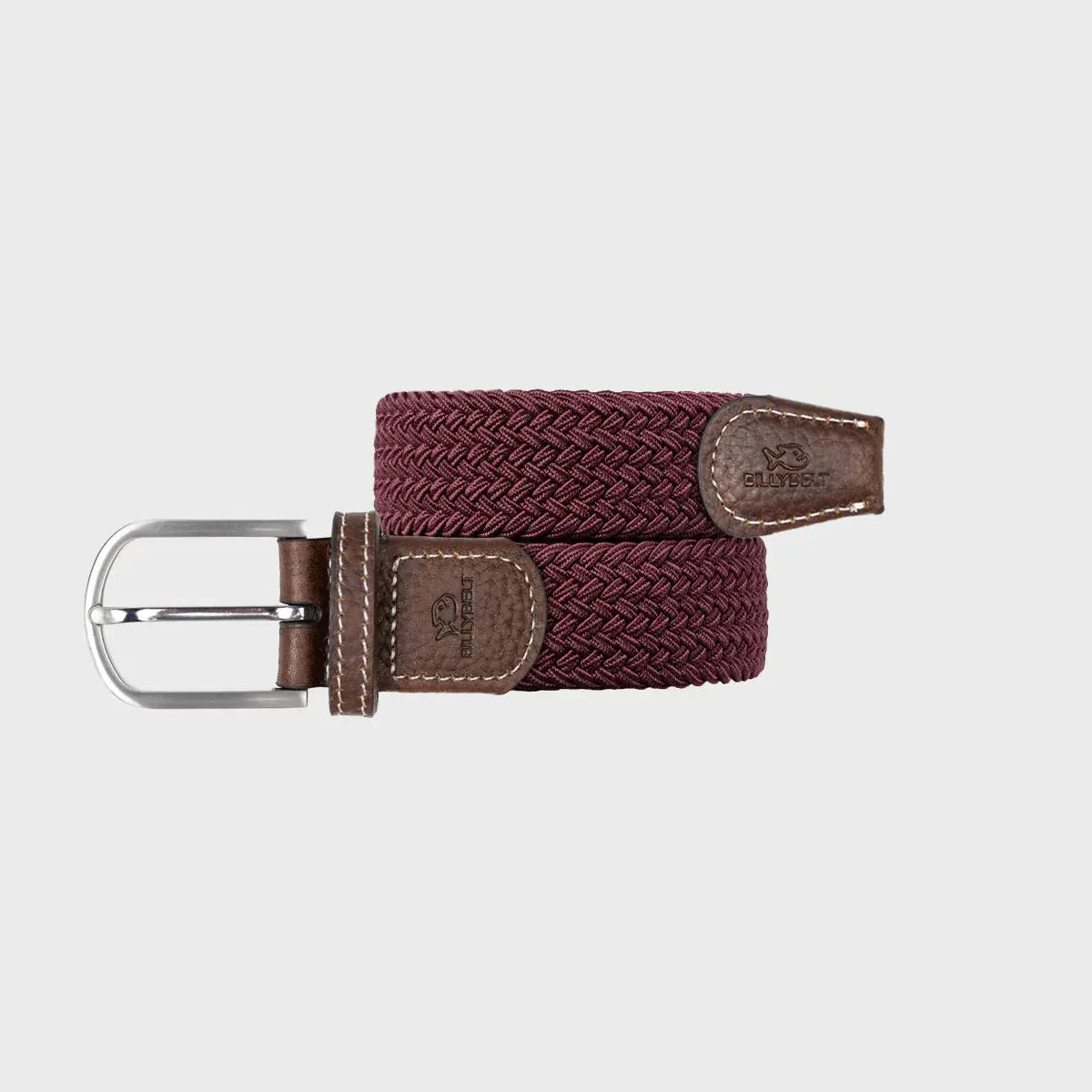 Ceinture tressée Lie de Vin enroulée : tressage uni bordeaux profond, boucle argentée et embouts de cuir marron