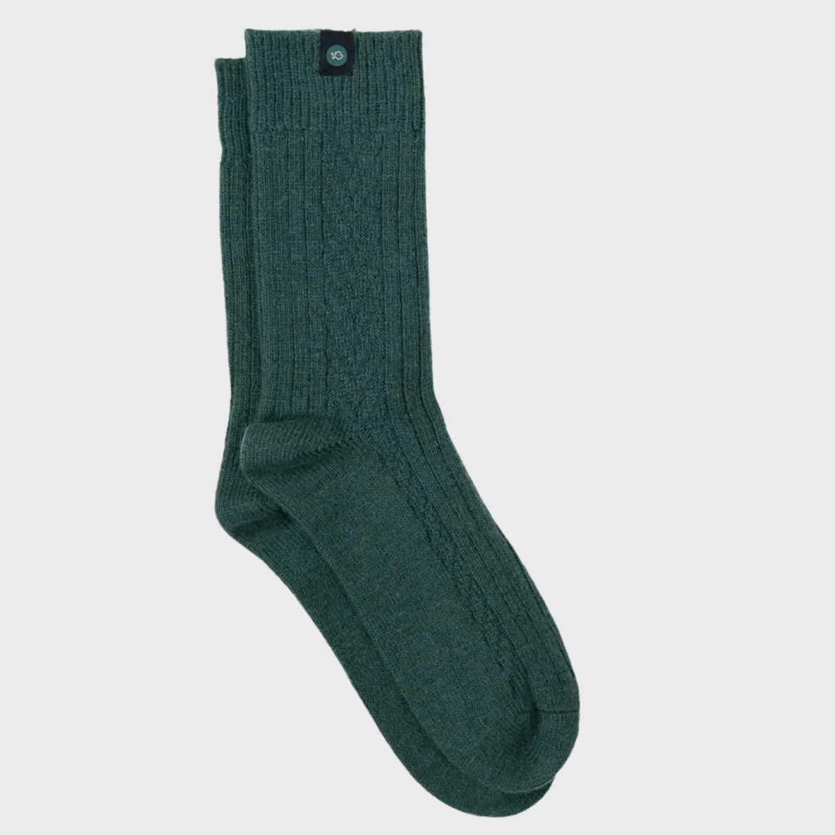 Chaussettes BillyBelt en laine vert sapin à plat, grosses côtes et étiquette noire à pastille vert sapin