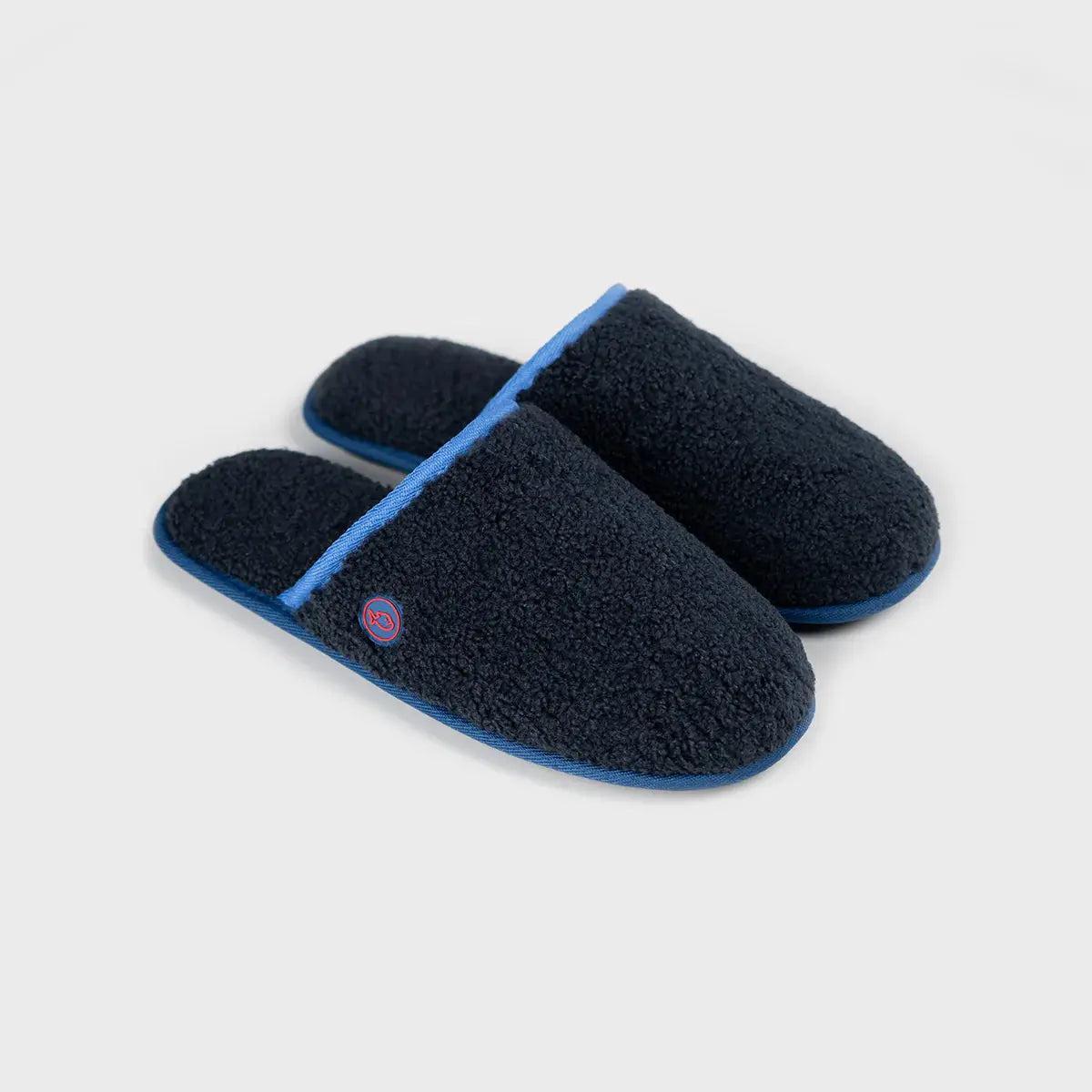 Paire de chaussons mules en sherpa bouclette Bleu Marine à passepoil bleu roi et fine semelle noire