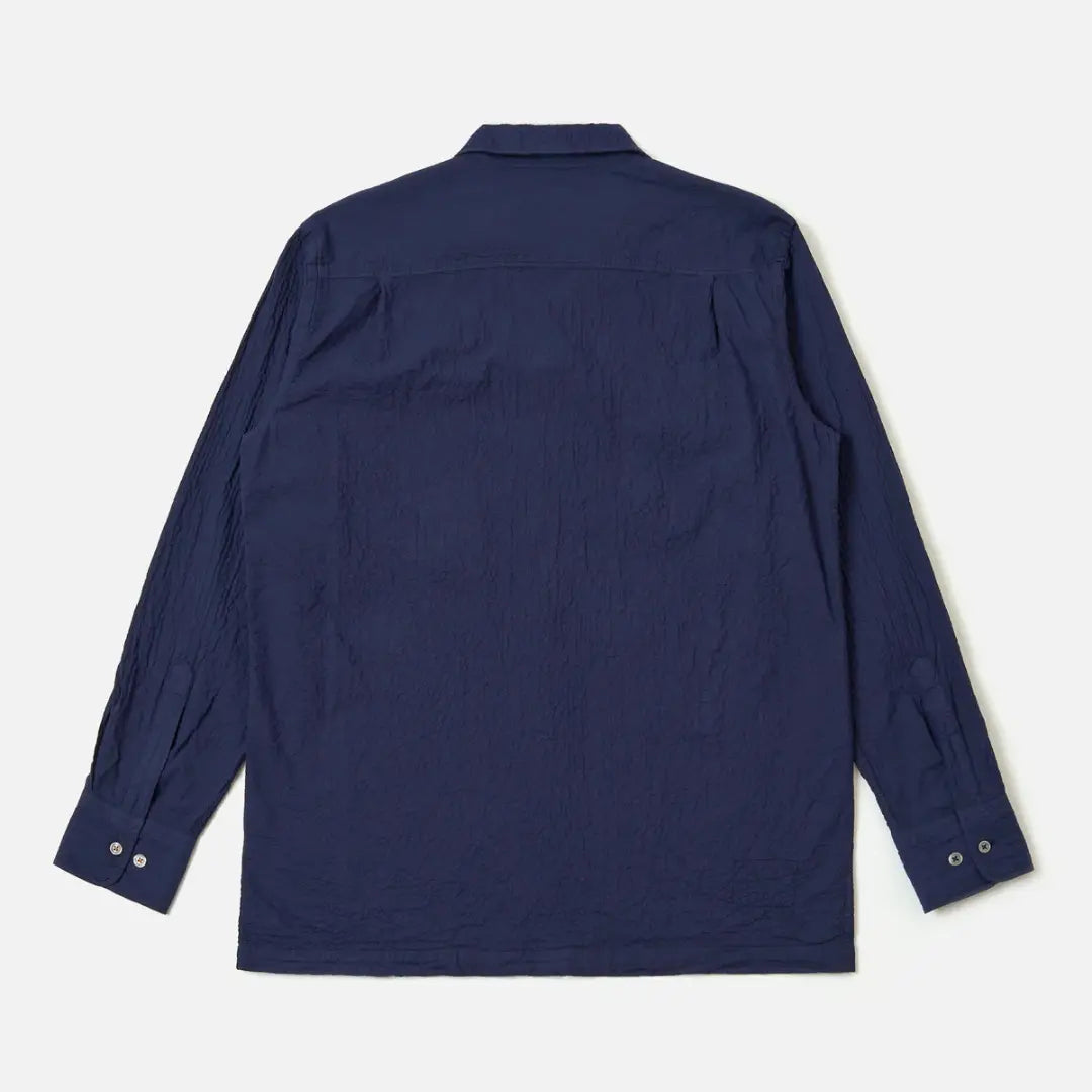 Dos de la chemise Attendant bleu marine, empiècement d'épaules et poignets à deux boutons