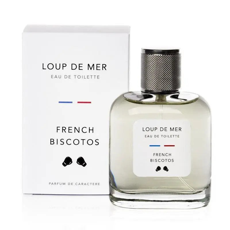 Flacon Loup de Mer posé devant son étui cartonné blanc, bouchon métal moleté apparent
