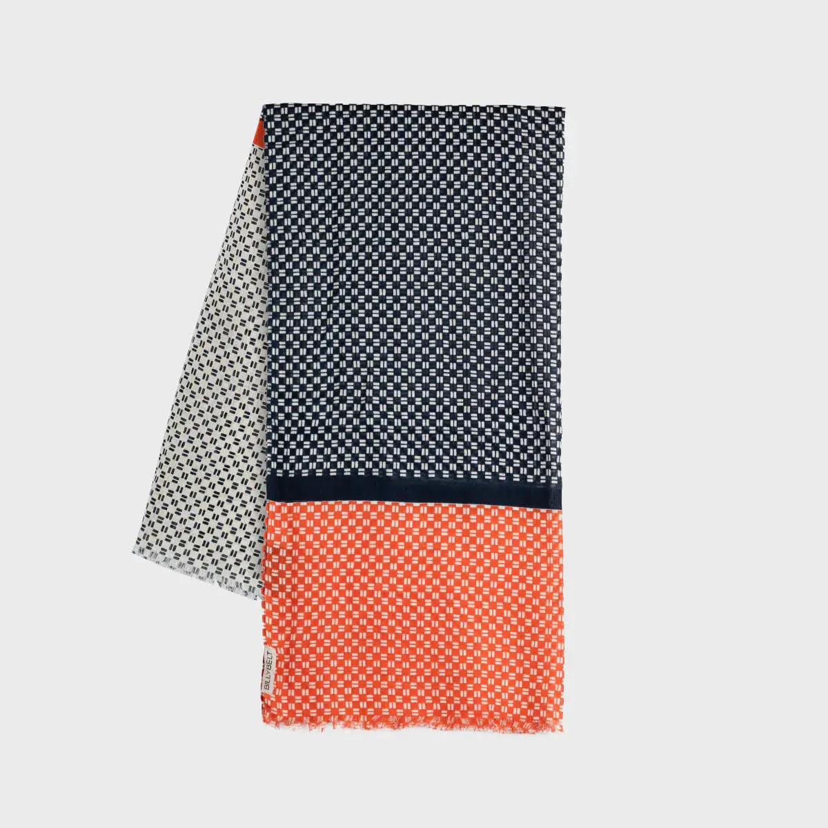 Foulard en coton plié, semis de tirets blancs sur Bleu Marine et large pan orange corail assorti