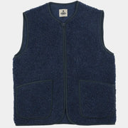 Gilet sans manches en laine bouclée bleu marine, zip central et deux poches plaquées bordées, vu de face
