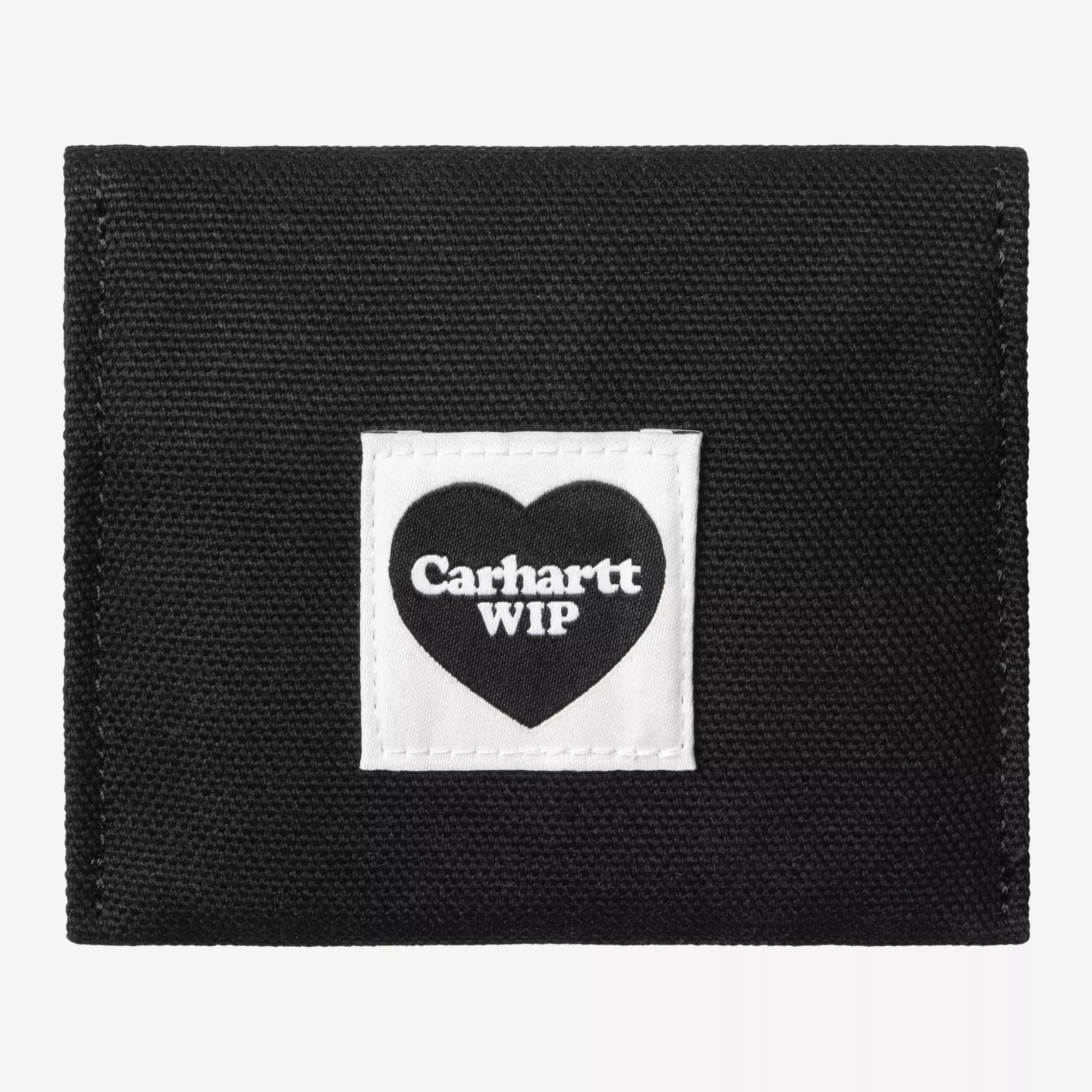 Pochette en toile cirée noire du miroir de poche Heart Carhartt WIP, fermée, Heart Label blanc cousu au centre