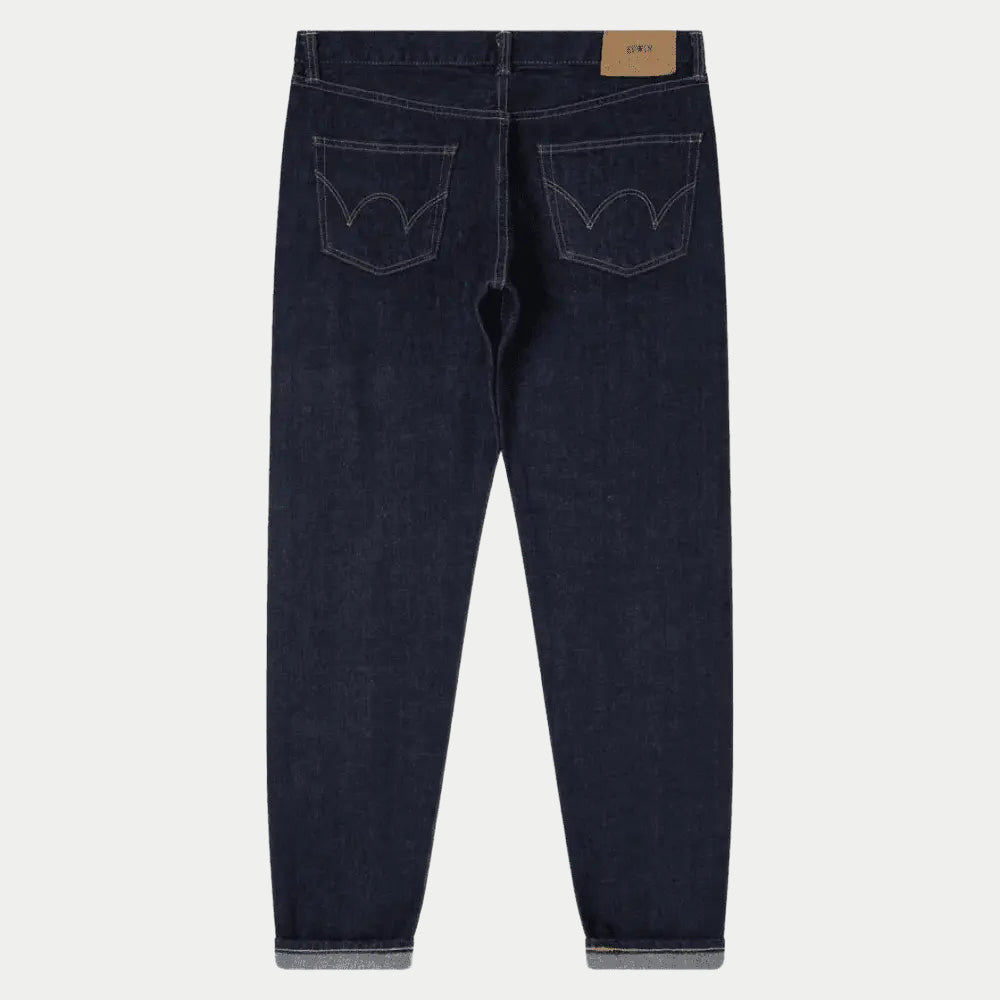 Dos à plat du jean Selvedge Regular Tapered Blue Rinsed, poches arquées surpiquées ton sur ton