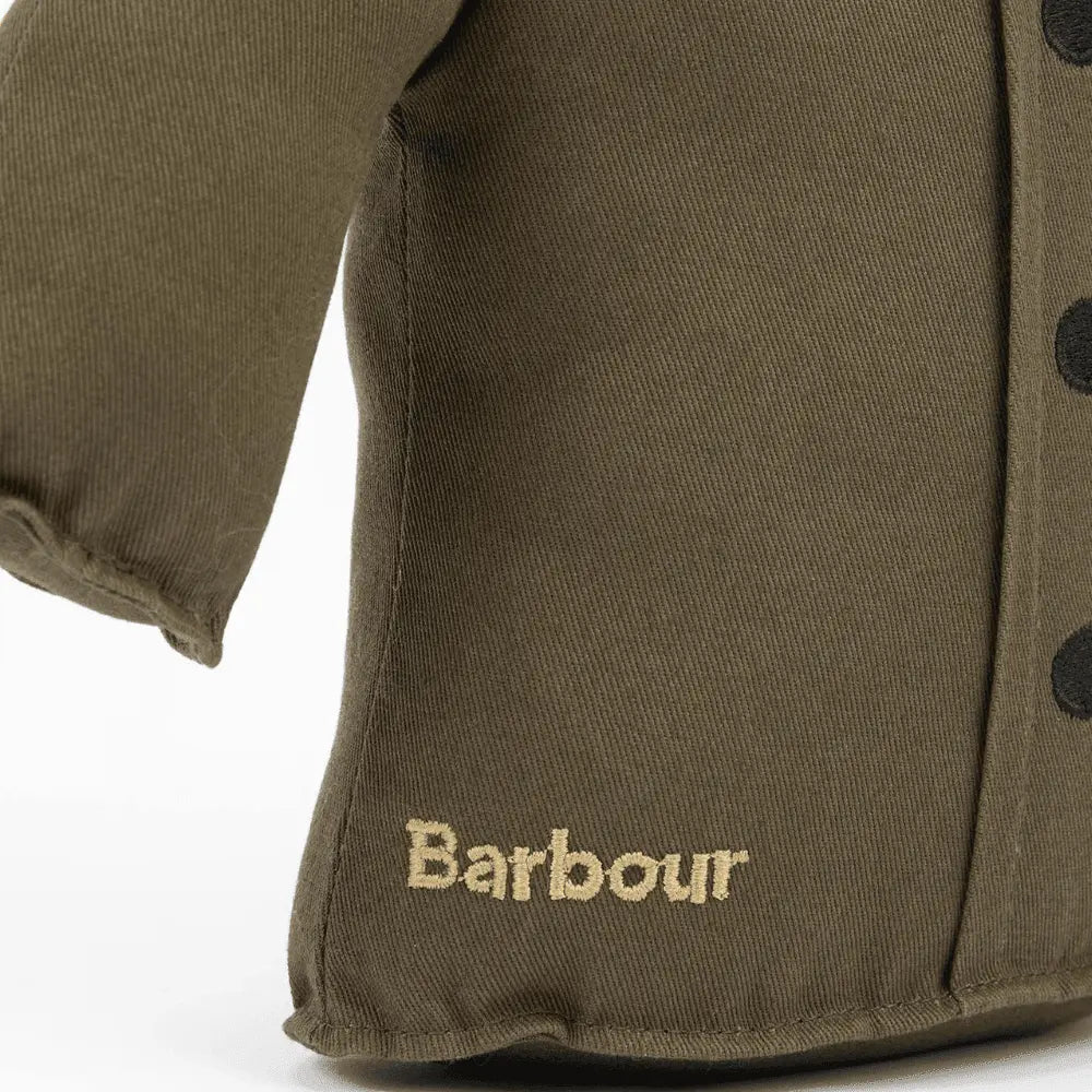 Détail du jouet veste olive, boutons noirs alignés et logo brodé doré au revers