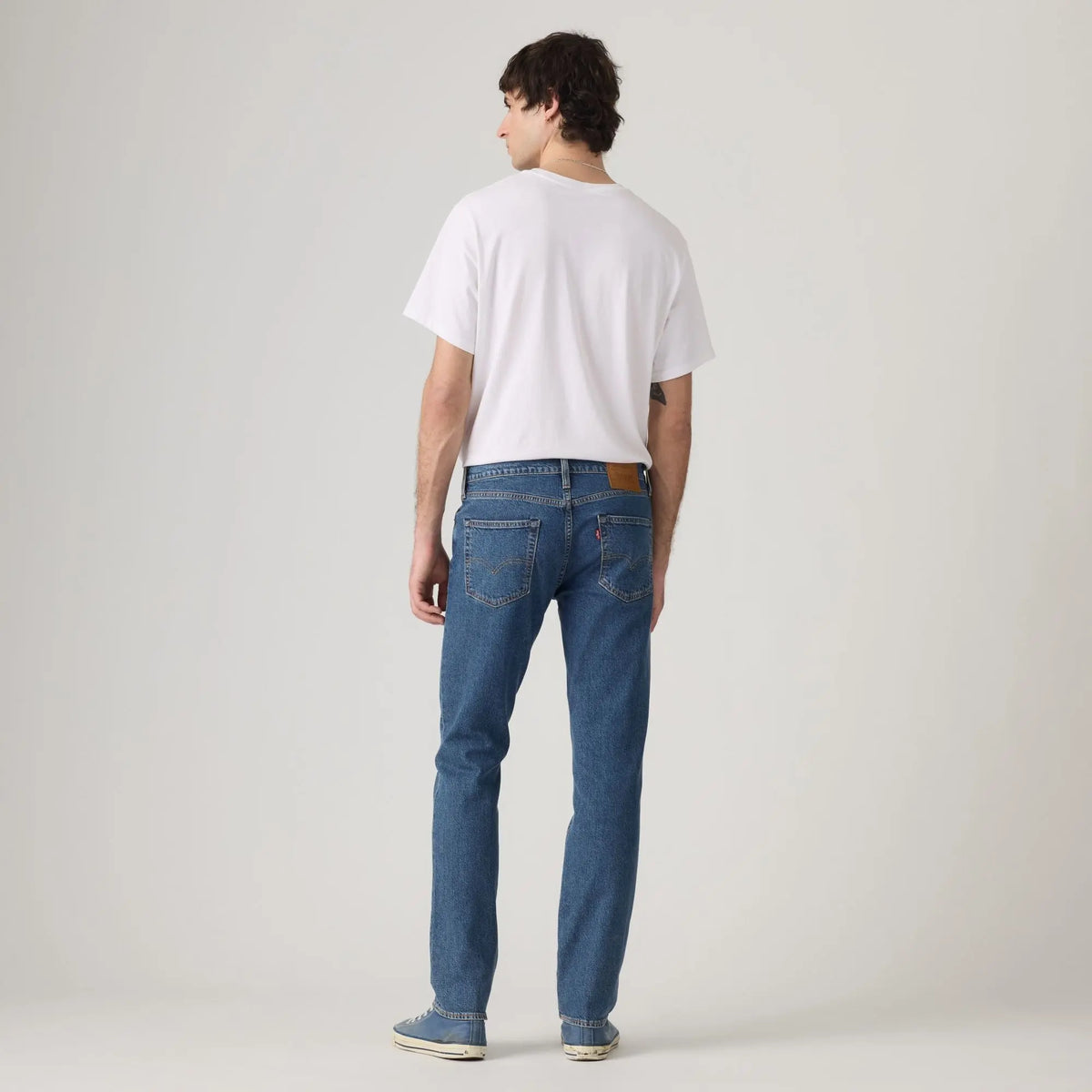 Jean Levi's 511 Slim Laugh It Off porté de dos : poches arrière, patch cuir et étiquette rouge Levi's