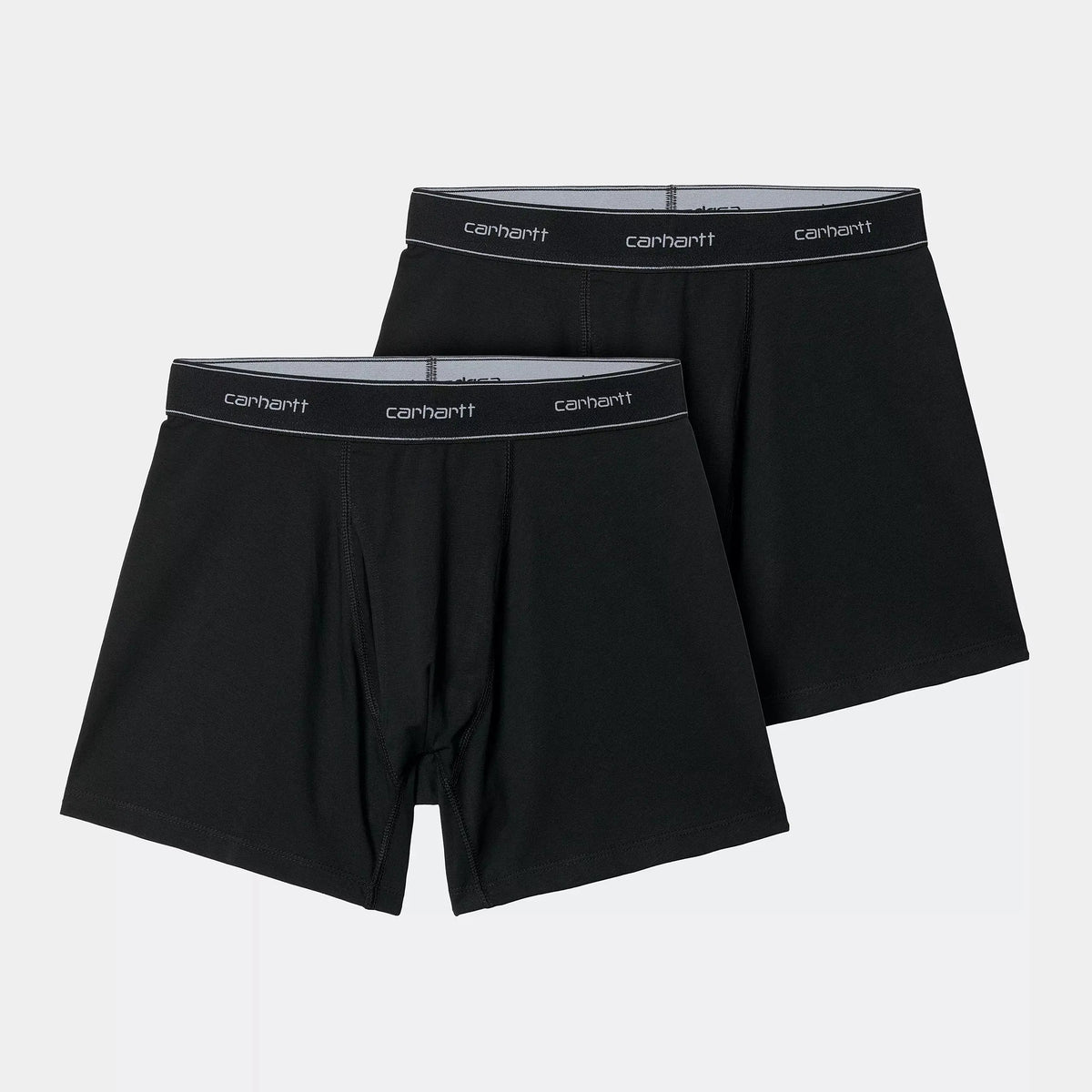 Les deux boxers noirs du lot posés à plat l'un sur l'autre, ceinture élastique large au lettrage gris