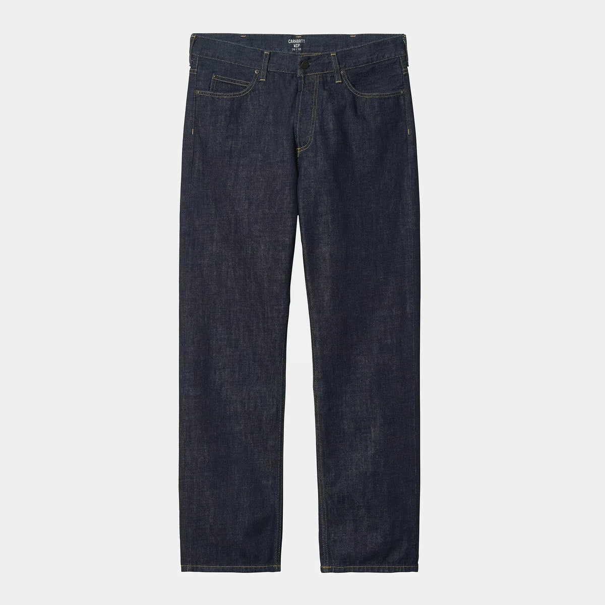 Marlow Pant Blue Rinsed à plat de face, denim brut rinsé texturé, rivets sombres et surpiqûres moutarde