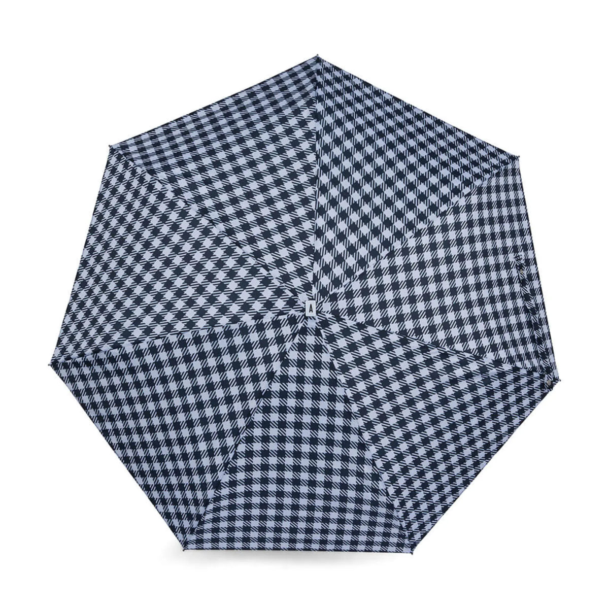 Toile ouverte du parapluie Kensington vue de dessus, damier vichy noir et blanc réparti sur sept pans