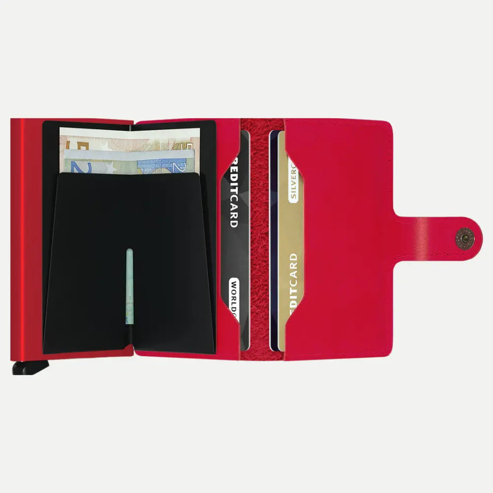 Portefeuille rouge grand ouvert : billets, doublure feutrine rouge et cartes dans les soufflets