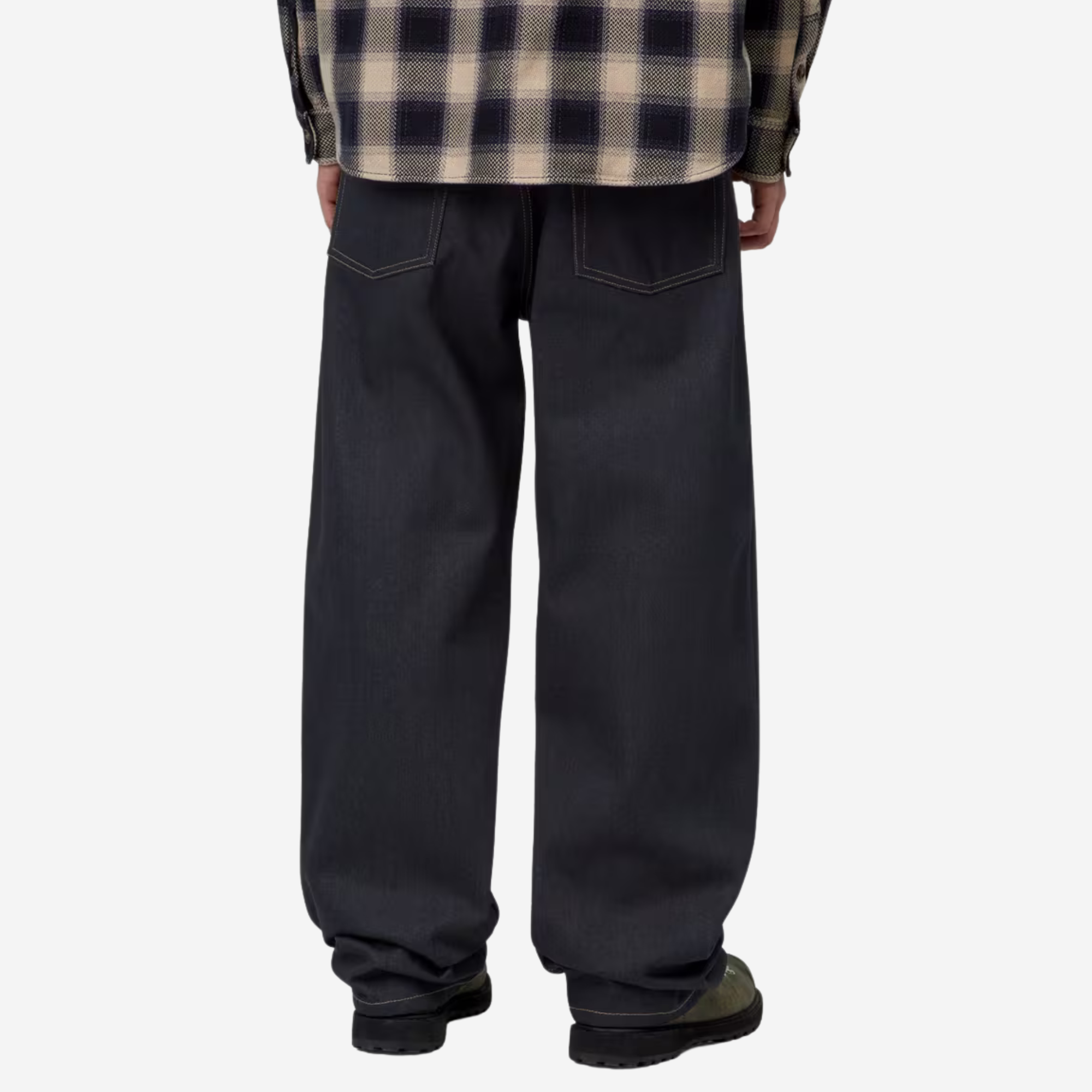 Jean Payson Carhartt WIP Blue Rigid porté de dos, tombant ample sur toute la jambe