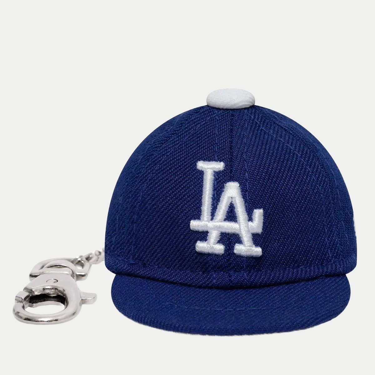 Porte-clés Mini Casquette LA Dodgers New Era - face avant, logo LA brodé blanc sur la couronne bleu roi
