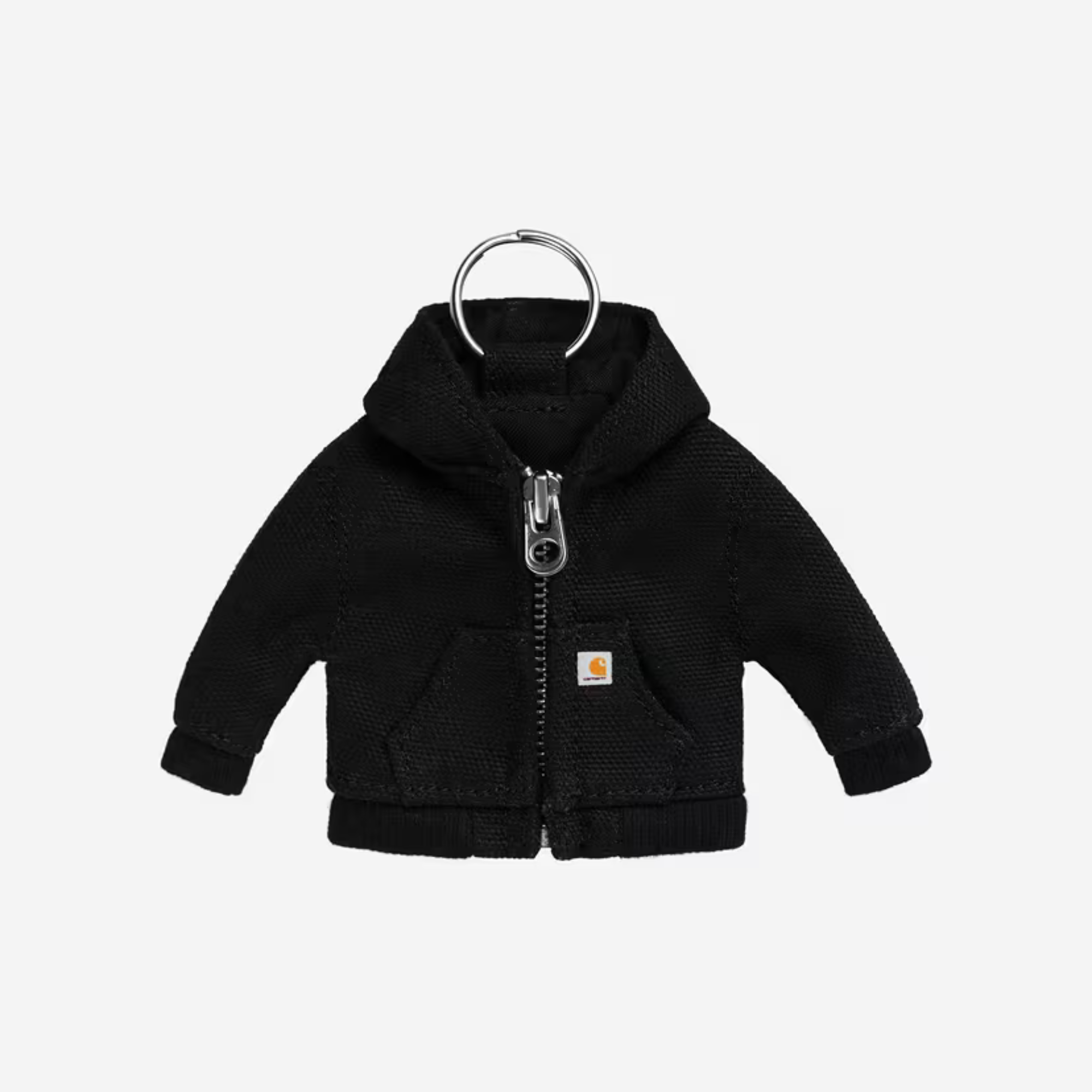 Porte-clés Mini Active Jacket noir Carhartt WIP vu de face : toile noire, zip et anneau argentés, étiquette Carhartt orange