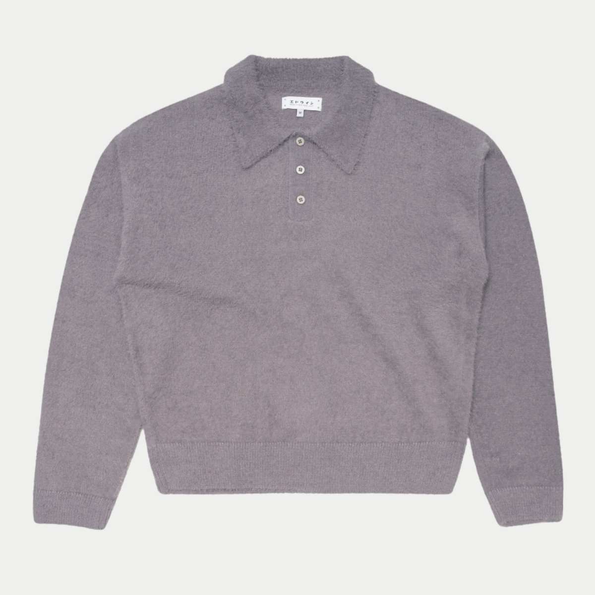 Pull polo Dex Edwin en maille brossée mauve grisé, vue à plat de face, patte trois boutons