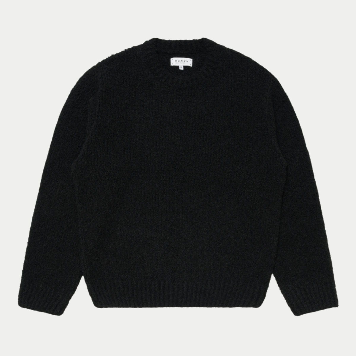 Pull Dun Edwin noir en maille bouclette, vue de face à plat, encolure ronde bordée et bas de corps côtelé