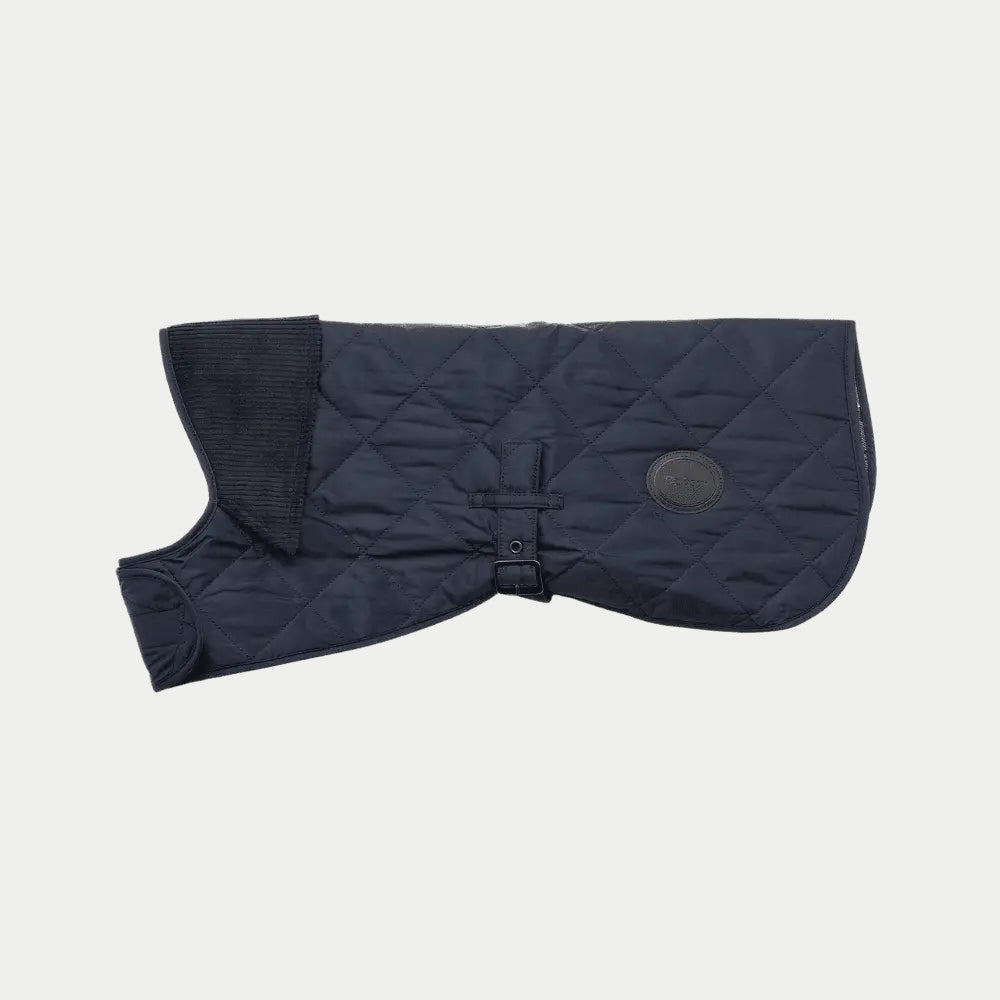 Manteau matelassé bleu marine à plat, losanges piqués, col côtelé et patch cuir ovale