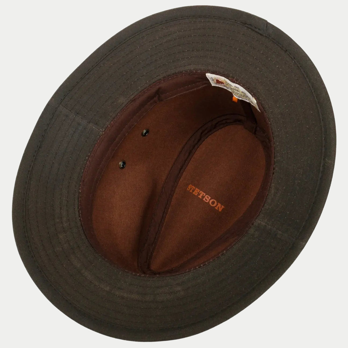Intérieur du Traveller, doublure marron, œillets d'aération et étiquette de marque