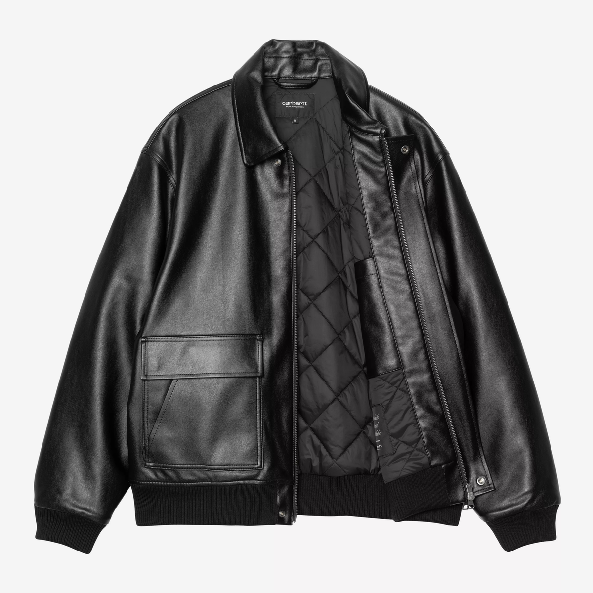 Veste Arizona noire Carhartt WIP ouverte sur sa doublure matelassée à losanges et sa fermeture zippée dissimulée sous patte