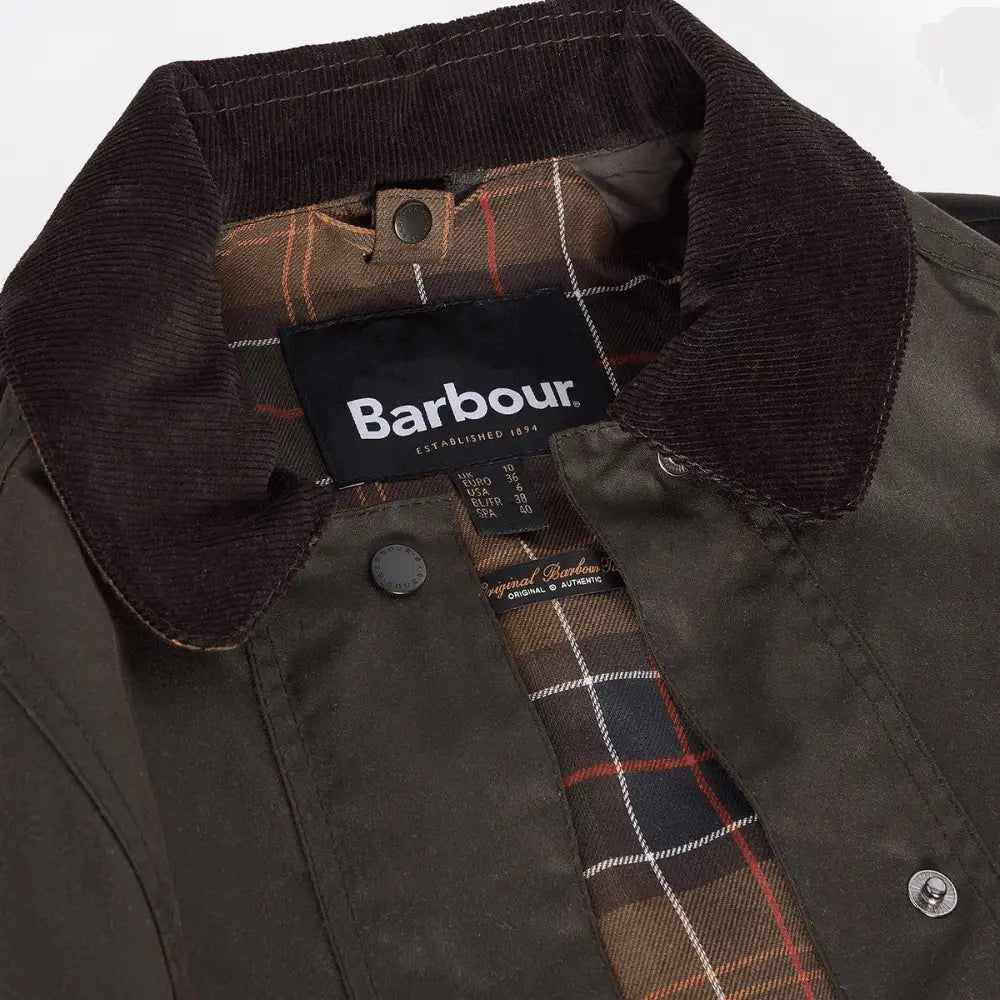 Intérieur de la Veste cirée Barbour Beadnell olive : col en velours côtelé brun et doublure tartan