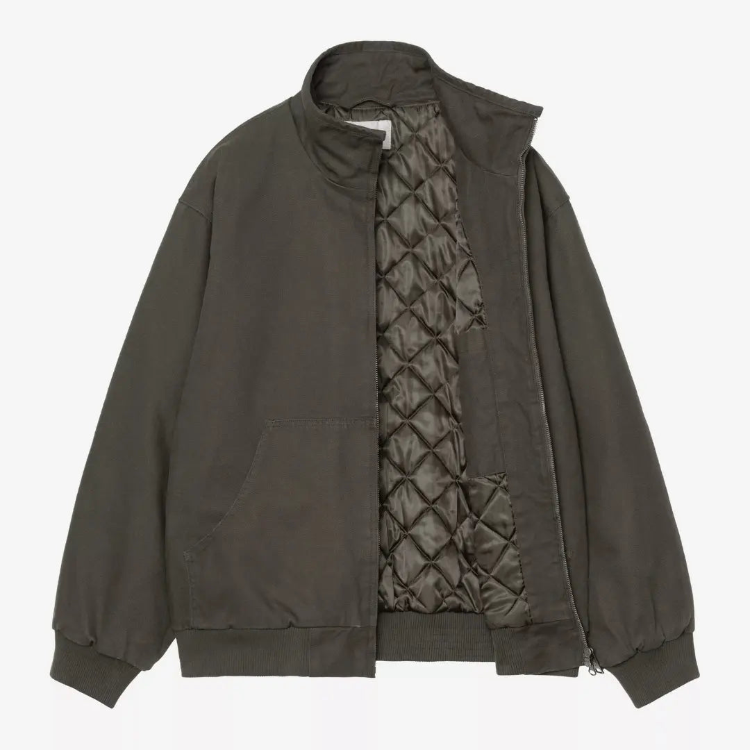 Veste Ravon Oxide Green ouverte à plat, doublure matelassée à losanges vert olive et poche intérieure