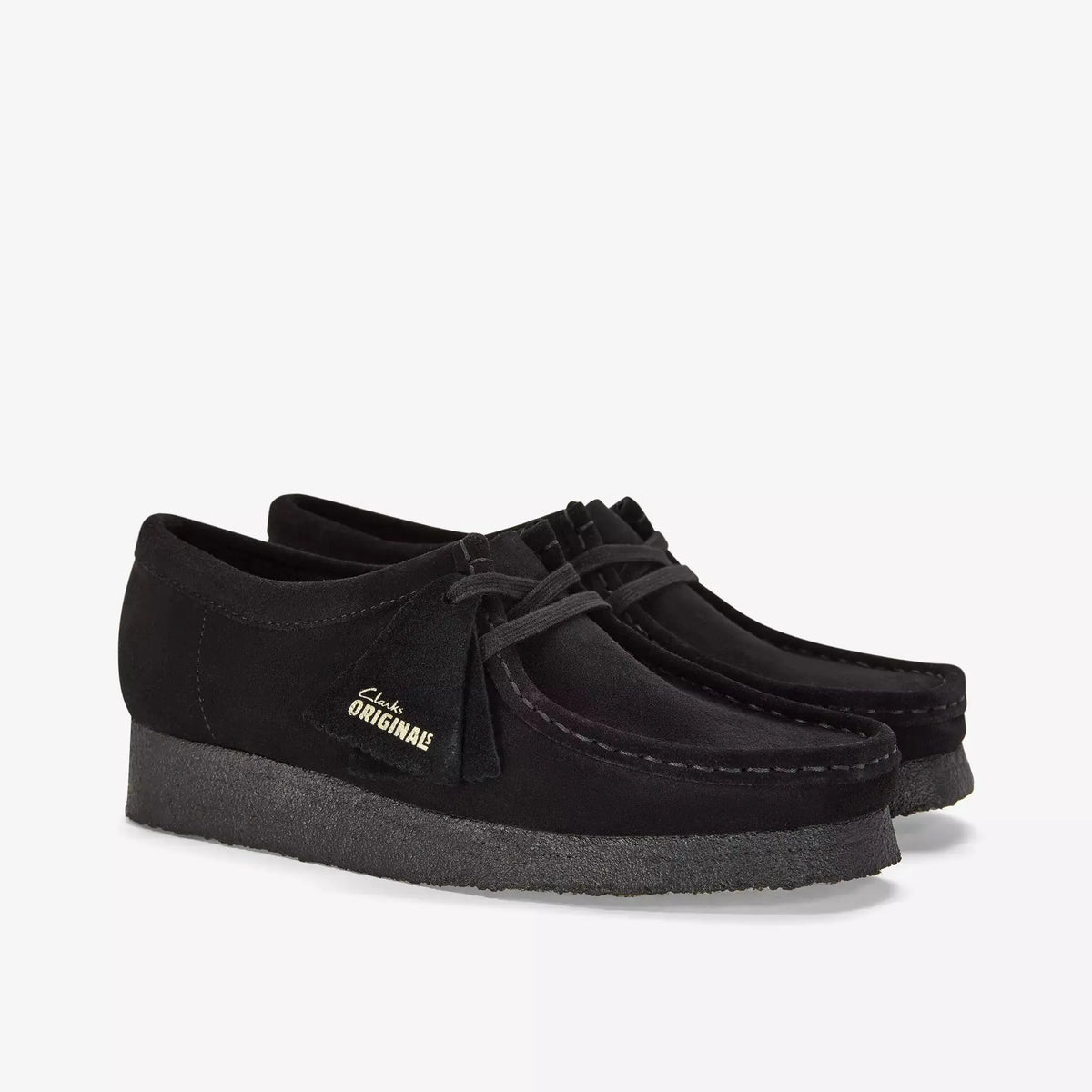 Paire de Wallabee noires en suède, vue trois-quarts avant