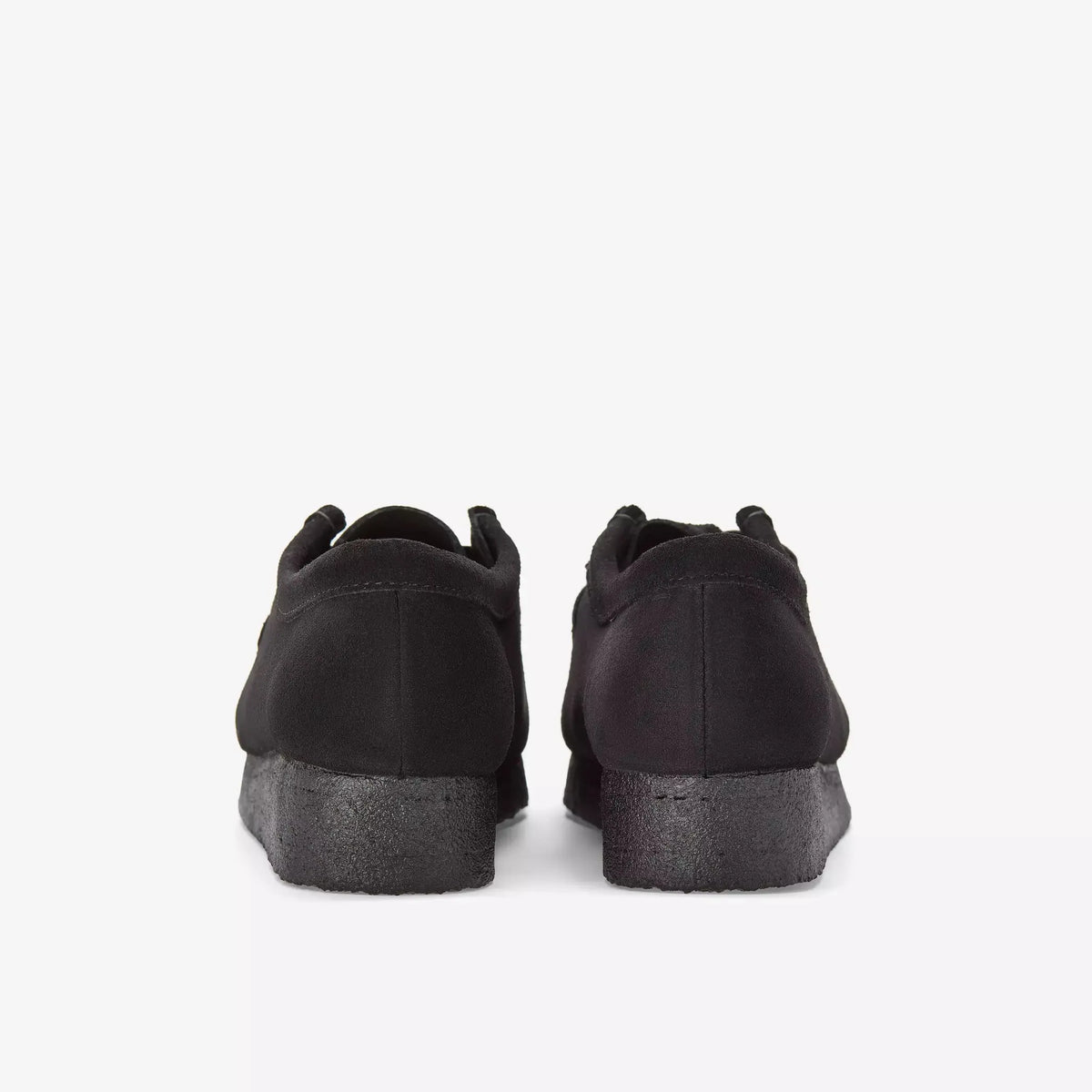 Wallabee noires vues de dos, contreforts en suède et semelle crêpe noire